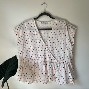Madewell ivory crossover peplum top with “rainbow clipdot” pattern, size large